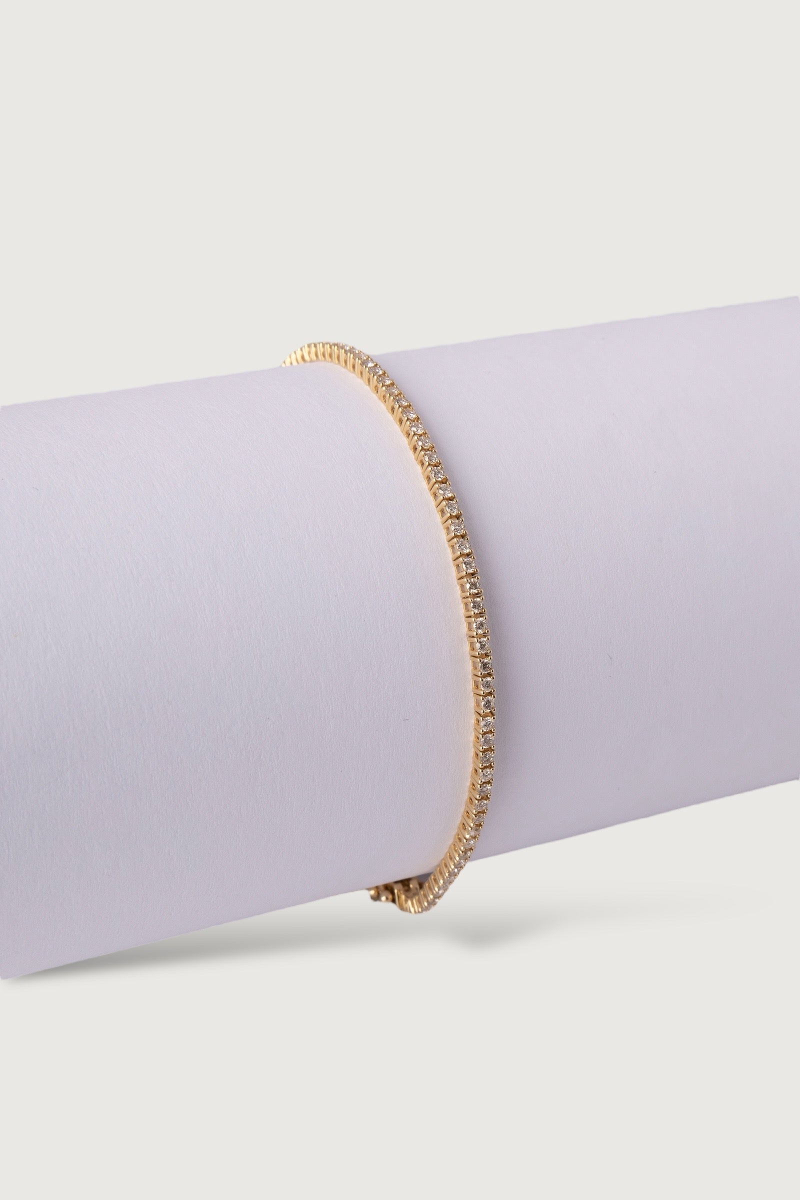 YELLOW GOLD FLEXIBLE TENNIS DIAMOND BRACELET