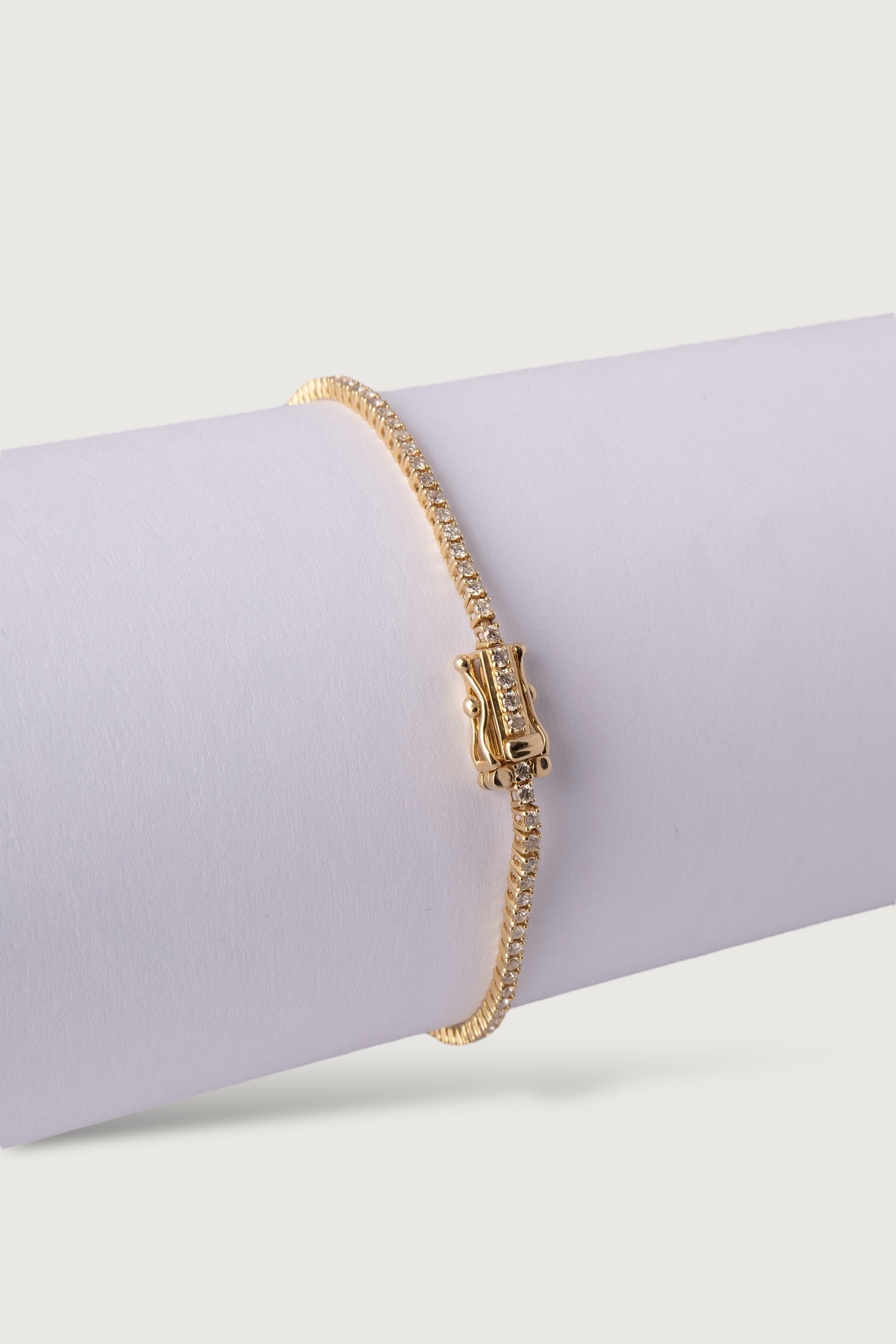 YELLOW GOLD FLEXIBLE TENNIS DIAMOND BRACELET